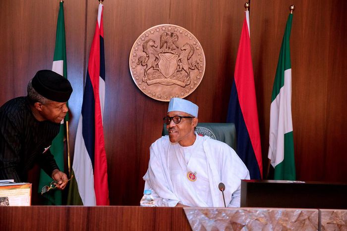 Vice President Yemi Osinbajo (left) with President Muhammadu Buhari (right) at Federal Executive Council (FEC) meeting