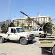 Forces loyal to Libya's Government of National Accord (GNA) gesture on April 18, 2019, after taking control of the area of al-Aziziyah, located some 40 kilometres south of the Libyan capital Tripoli, following fierce clashes with forces loyal to strong...