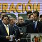 Venezuelan opposition leader Juan Guaido (right) speaks next to his deputy Edgar Zambrano, one of 10 opposition lawmakers who have been indicted for conspiracy and treason