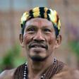 A Waorani indigenous man takes part in a march over oil exploration in his ancestral lands