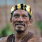 A Waorani indigenous man takes part in a march over oil exploration in his ancestral lands