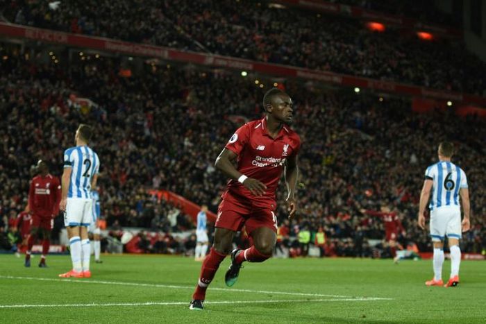 Liverpool's Sadio Mane celebrates scoring in the rout of Huddersfield