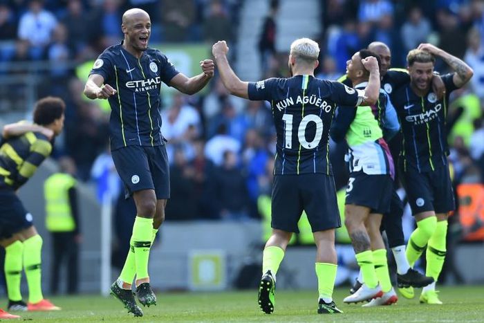 Manchester City celebrate retaining the Premier League title