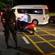 Sri Lankan security personnel stand guard at a checkpoint on a roadside in Colombo on May 13, 2019. A Muslim man was slashed to death in Sri Lanka, police said after imposing a nationwide curfew to contain a violent new backlash against Easter suicide ...