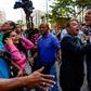 Opposition lawmaker Gilber Caro, pictured in 2016 (second from right), was arrested in a restaurant in the Las Mercedes neighborhood of the capital Caracas
