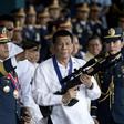 A victory for allies in Senate elections could see Philippines President Rodrigo Duterte (C) press major changes to the nation's constitution