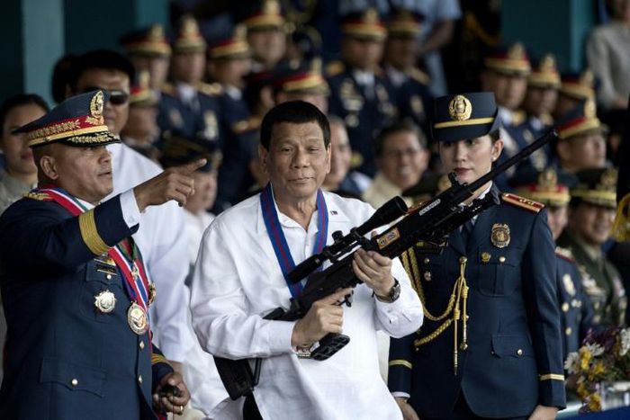 A victory for allies in Senate elections could see Philippines President Rodrigo Duterte (C) press major changes to the nation's constitution