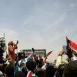 Sudanese protesters chant slogans during a rally outside the army complex in Sudan's capital Khartoum on April 20, 2019