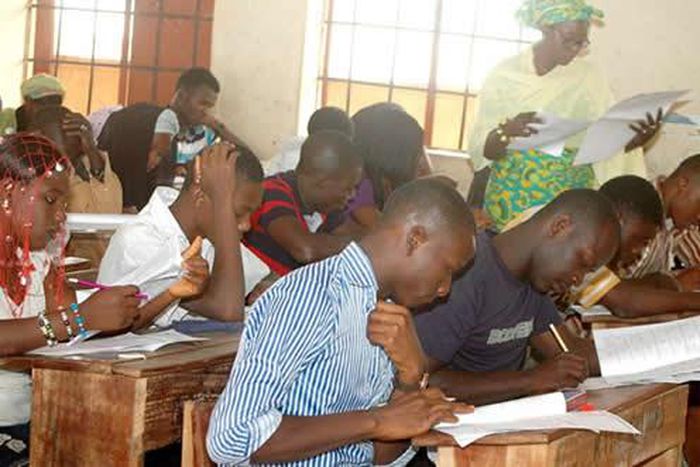 Students writing jamb