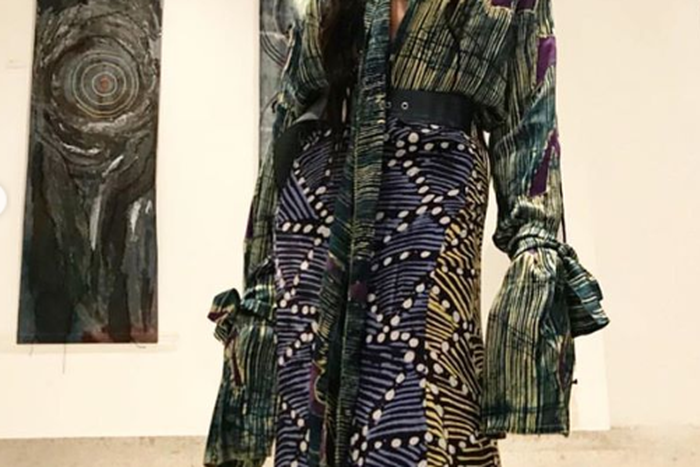 Naomi Campbell poses on the steps of ALARA wearing Tiffany Amber [Credit: Instagram/ BellaNiajaStyle]