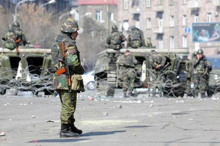 Armenian riot police are seen patrolling Yerevan in March 2008 after clashing with supporters of the defeated opposition candidate following elections