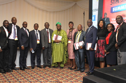 Middle: Chairman of the occasion, Emeritus Professor Ayodele Falase (Cardiologist/Former Vice-Chancellor, University of Ibadan) flanked by other healthcare specialists and Novartis associates at the Summit