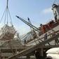 Yemeni workers unload wheat provided by the UN childrens's agency in Hodeida in January, 2018, before fighting for the lifeline aid port erupted between the rebels and the Saudi-backed government in June