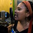 Filutraru Paillafilu (L) and Ana Millaleo, members of the Wechekeche Ni Trawun rap group, rehearse in Santiago