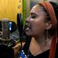 Filutraru Paillafilu (L) and Ana Millaleo, members of the Wechekeche Ni Trawun rap group, rehearse in Santiago