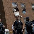 Pro-Nicolas Maduro supporters and activists occupying the Venezuelan embassy in Washington waved earlier this week from a window to Reverend Jesse Jackson (unseen) who came to support them. The opposition said Thursday the building had been cleared by ...