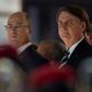 Brazilian President Jair Bolsonaro (C), seen here at a ceremony marking the 130th anniversary of the Rio de Janeiro Military School (CMRJ), was the target of protests over deep budget cuts in public education