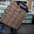 A worker pulls a cart at the "Central de Abasto" wholesale market in Mexico City on January 14, 2019