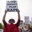 Some of the protesters in Montgomery, Alabama dressed as characters forced to bear children of rape in the dystopian novel and television series "The Handmaid's Tale"