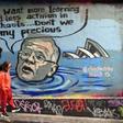 Mural in Melbourne shows Australian Prime Minister Scott Morrison holding a lump of coal as it advertises a rally by students around the world to protest climate change