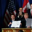 Mexico's President Enrique Pena Nieto (L) US President Donald Trump (C) and Canadian Prime Minister Justin Trudeau, are pictured in November 2018 after signing a new free trade agreement in Buenos Aires