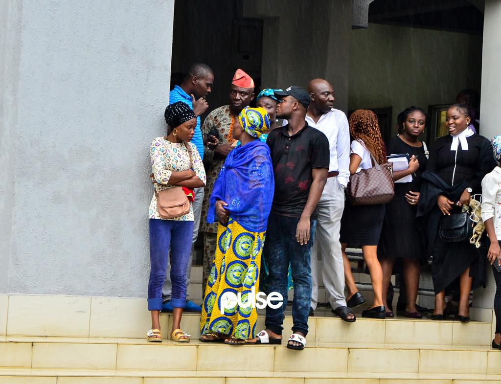 Naira Marley's family members standing outside the court room [PULSE]