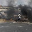 Smoke rises from a barricade in Wednesday's unrest