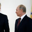 US Ambassador to Russia Jon Huntsman, pictured next to President Vladimir Putin, will not attend a major economic forum in Saint Petersburg next month