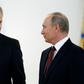 US Ambassador to Russia Jon Huntsman, pictured next to President Vladimir Putin, will not attend a major economic forum in Saint Petersburg next month