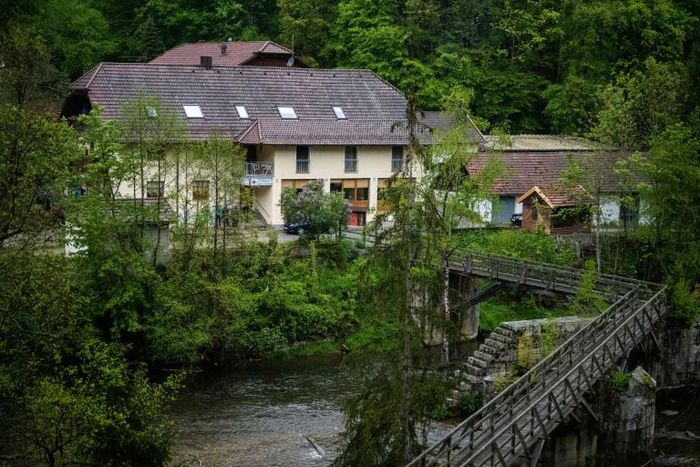A hotel on the banks of the river Ilz in Passau, southern Germany, were police are investigating the baffling deaths of three people found in a room of the Bavarian hotel with crossbow bolts in their bodies.