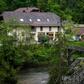 A hotel on the banks of the river Ilz in Passau, southern Germany, were police are investigating the baffling deaths of three people found in a room of the Bavarian hotel with crossbow bolts in their bodies.