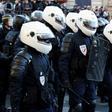 Politicians and police unions have angrily condemned some protesters who chanted "commit suicide!" at officers