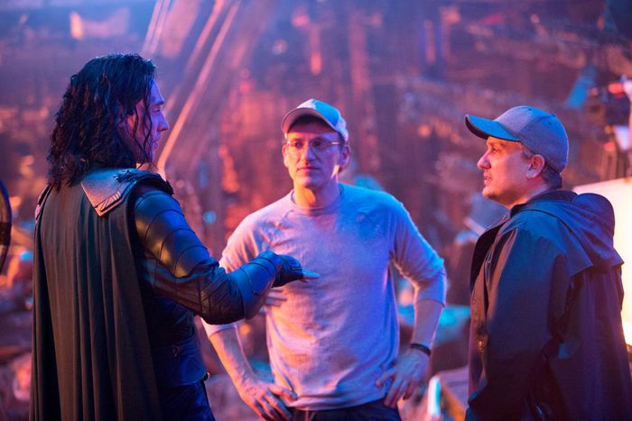 The Russo Brothers (Joe and Anthony Russo) alongside Tom Hiddleston on the set of Avengers: Infinity War.
