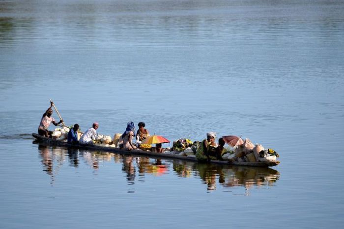 Motorised canoes, also called pirogues, are commonly used to transport people and goods in DR Congo