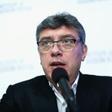 Russian opposition leader Boris Nemtsov airs allegations of corruption at the Sochi Olympics during a 2014 news conference in Washington -- a year before he was killed in Moscow