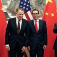 Chinese Vice Premier Liu He (R) gestures as US Treasury Secretary Steven Mnuchin (C) chats with US Trade Representative Robert Lighthizer in Beijing on May 1, 2019