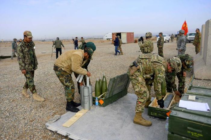 US, Italian and Afghan troops prepare shells during a February 2019 training exercise in Afghanistan's Herat province