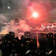 Indonesian riot police fire tear gas at protesters demonstrating against the re-election of Indonesian president Joko Widodo. Authorities say they uncovered an assassination plot that could have been libnked to the riots