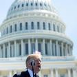 Donald Trump signed an order prohibiting purchase of equipment from companies that pose 'an unacceptable risk to the national security'