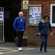 Voters went to the polls Thursday in mainly rural and suburban areas of England, with more than 8,000 seats up for grabs.