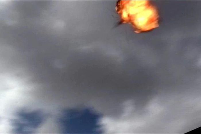 An image grab taken from a video obtained by AFPTV shows the moment a drone exploded above Yemen's Al-Anad airbase in the government-held southern province of Lahj on January 10, 2019
