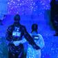 Two of Madonna's dancers are seen side-by-side with Israeli and Palestinian flags on their backs during her performance at Eurovision