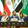A handout picture released by the Iraqi parliament's press office on April 20, 2019 shows Speaker Mohammed al-Halbusi presiding over a conference with peers from neighbouring countries' legislatures