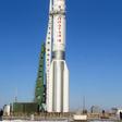 AsiaSat 7, a US-made satellite built for Hong Kong's AsiaSat, sits aboard a Proton-M rocket ahead of launch in Kazakhstan in 2011