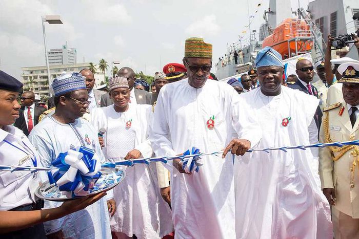 From left, Minister of Defence, Mansur Dan Ali, President Muhammadu Buhari and Akinwumi (Guardian)