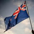 A New Zealand flag held at a vigil for the Christchurch mosque massacres. New Zealand has offered permanent residency to those directly affected by the attacks
