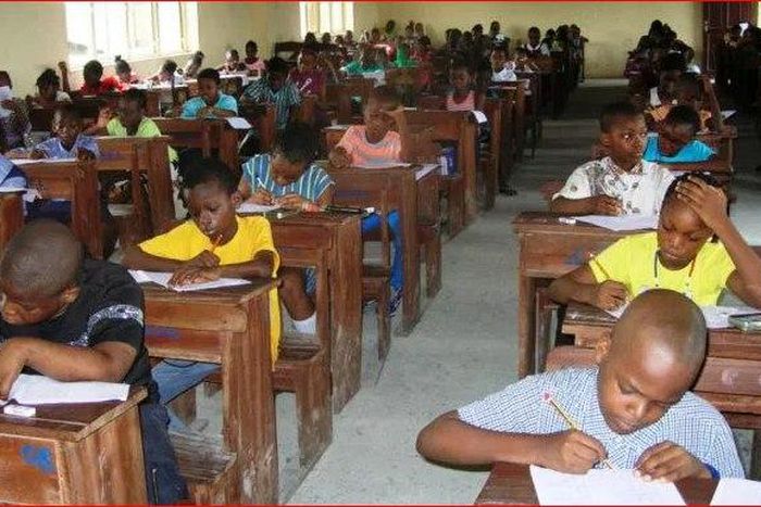 Pupils writing common entrance examination