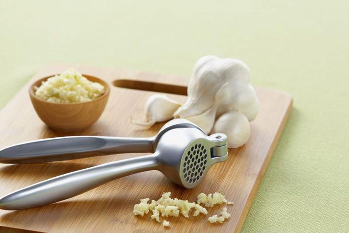 Learn How To Use A Garlic Press