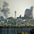 Israel launched a wave of strikes on Gaza after it said Palestinian militants in the Strip fired hundreds of rockets into Israeli territory