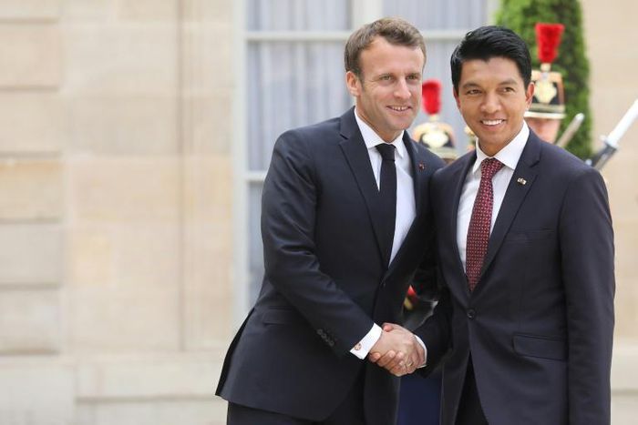 After talks with French President Emmanuel Macron (L), Madagascar President Andry Rajoelina said he believed his party and allies were on course for a majority in the country's new parliament